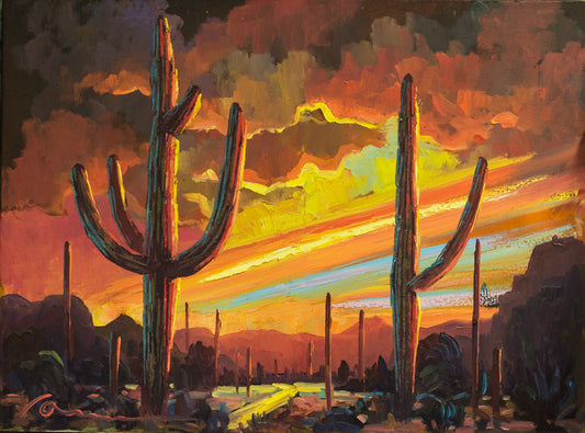 Arizona desert sunset painting by Miguel Camarena featuring saguaro cacti silhouetted against colorful orange and gold sunset clouds in the Sonoran Desert.